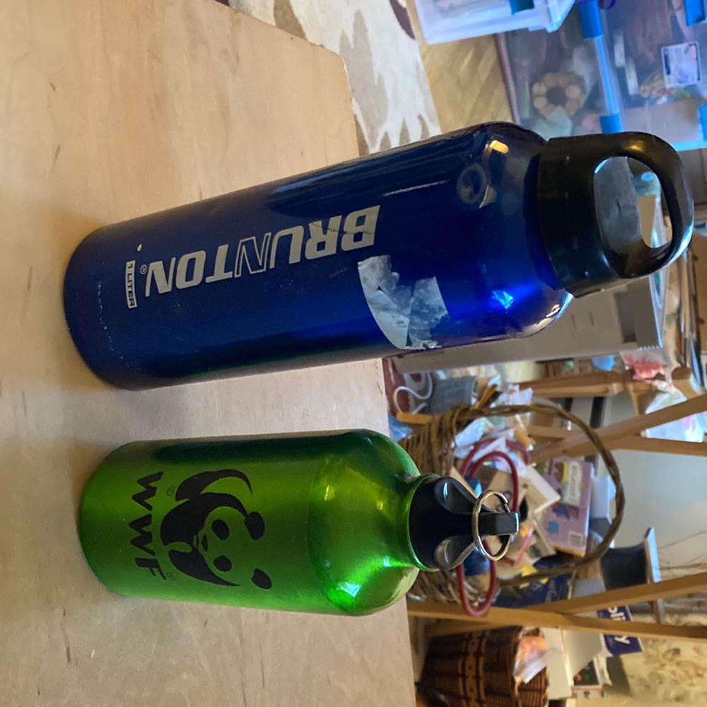 2 aluminum liquid bottles